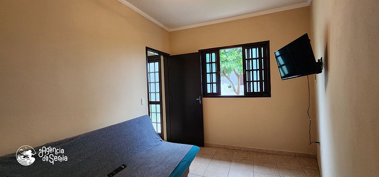 Aconchegante casa c/ jardim a 400m da praia