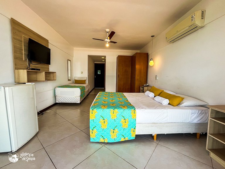 Suíte para 3 pessoas com vista e pertinho da praia