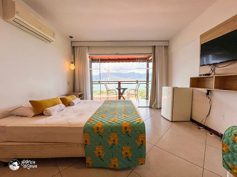 Suíte para 3 pessoas com vista e pertinho da praia