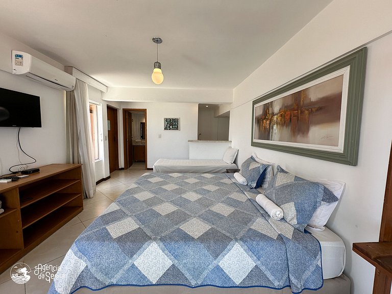 Suíte aconchegante para 3 c/ vista e perto do mar