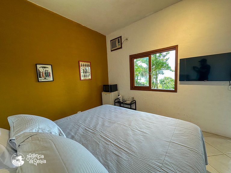 Suíte vista-mar a 400 metros da praia, em Ilhabela