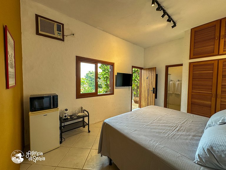 Suíte vista-mar a 400 metros da praia, em Ilhabela