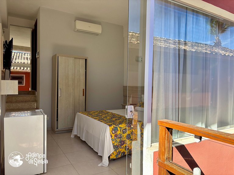 Studio perto da praia com piscina no condomínio